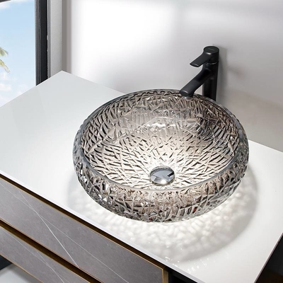 L'évier décoratif passé au bichromate de potasse de salle de bains roule forme de boule autour de l'évier en verre argenté de navire
